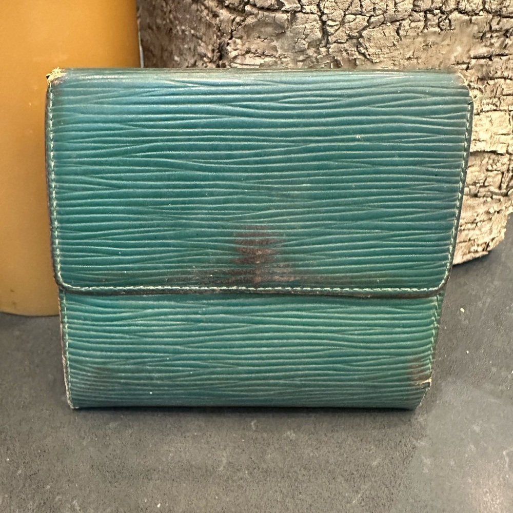 LV distressed epi leather wallet in green.